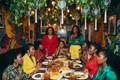 Stylish Black women in colorful outfits enjoying soul food in Atlanta